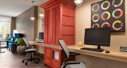Business Center with Desktop Computers, Office Chairs and Red Cabinet
