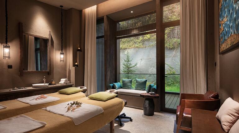 Spa treatment room with massage tables