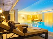 Indoor Pool at Spa with Lounge Seating on Deck