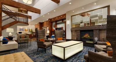 Lobby with seating and fireplace