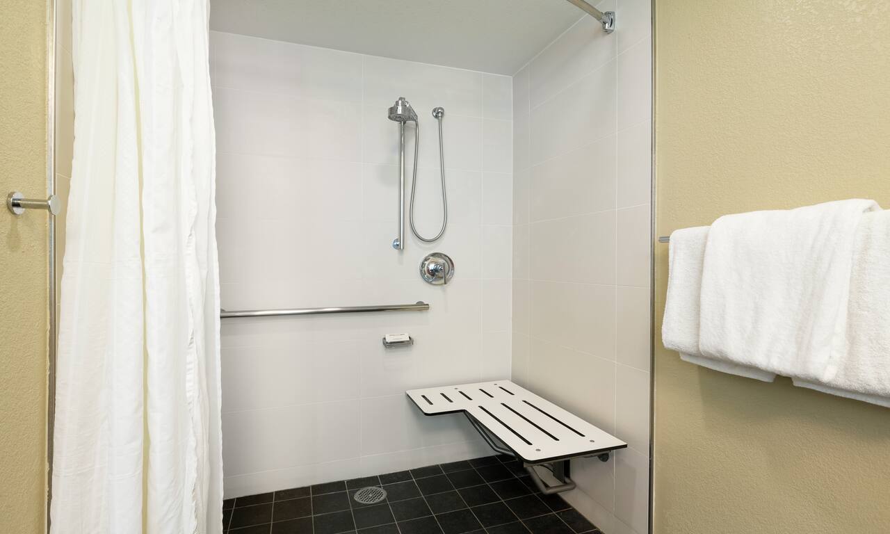 Accessible Guestroom Bathroom with Roll-In Shower-transition