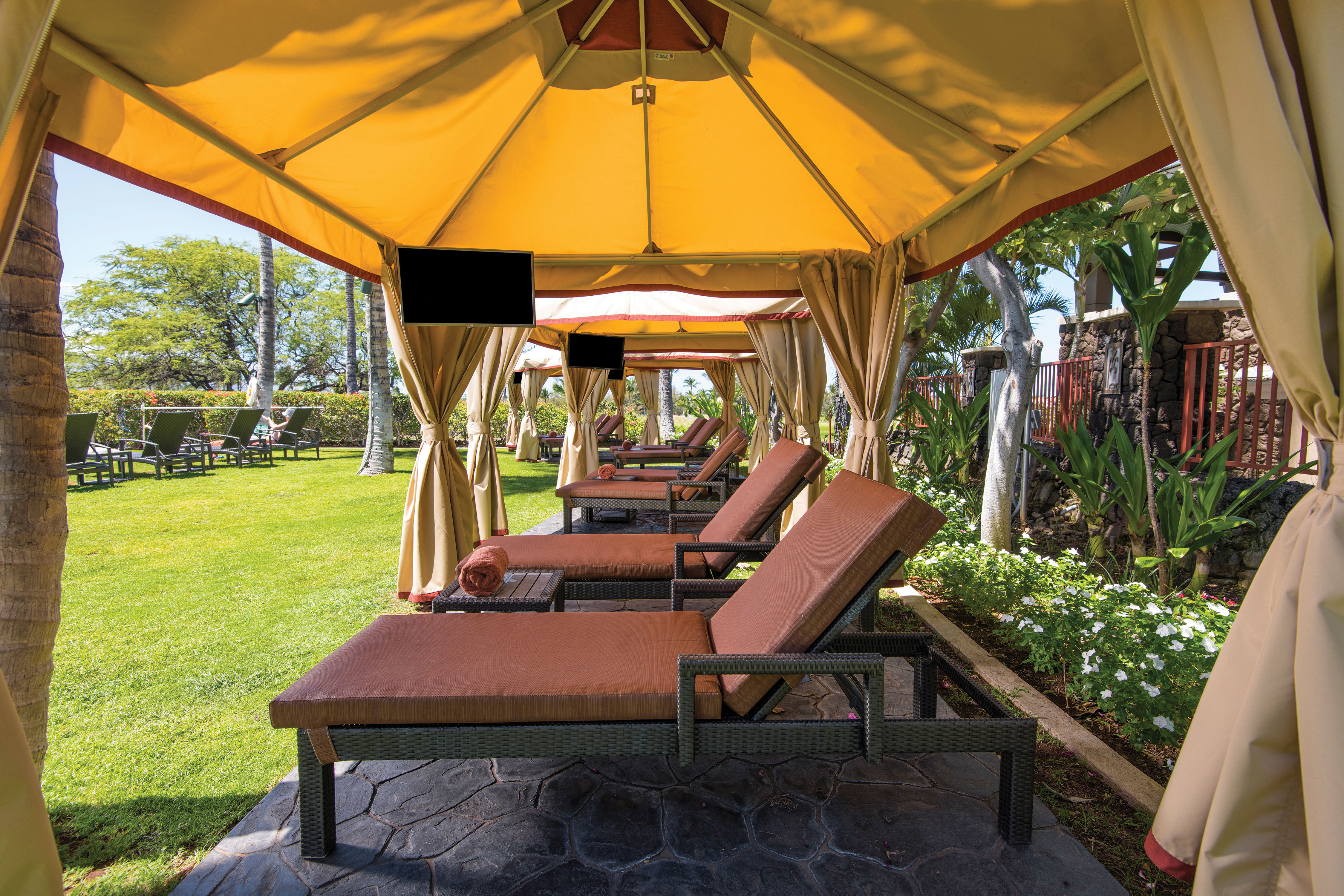 Outdoor Area Cabanas with Lounge Chairs
