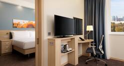 TV in suite with bed