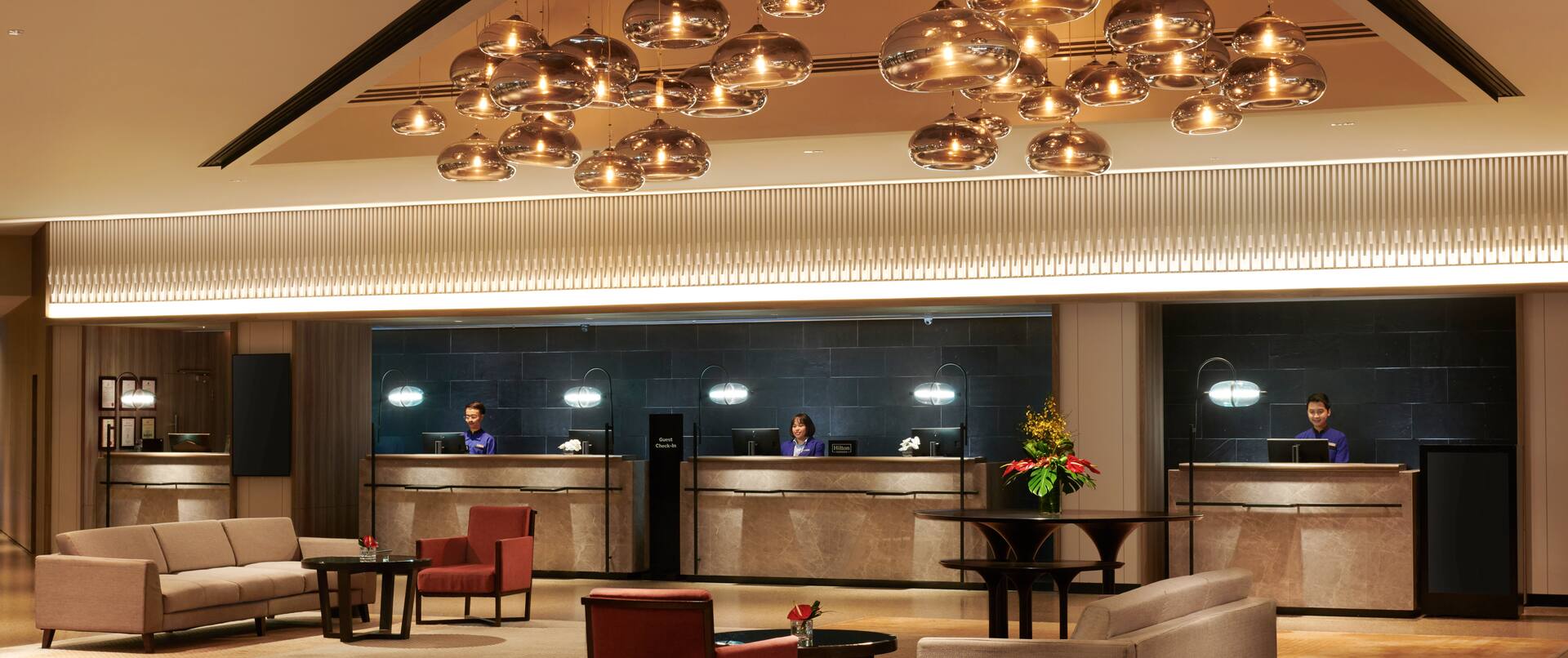 lobby front desk with team members