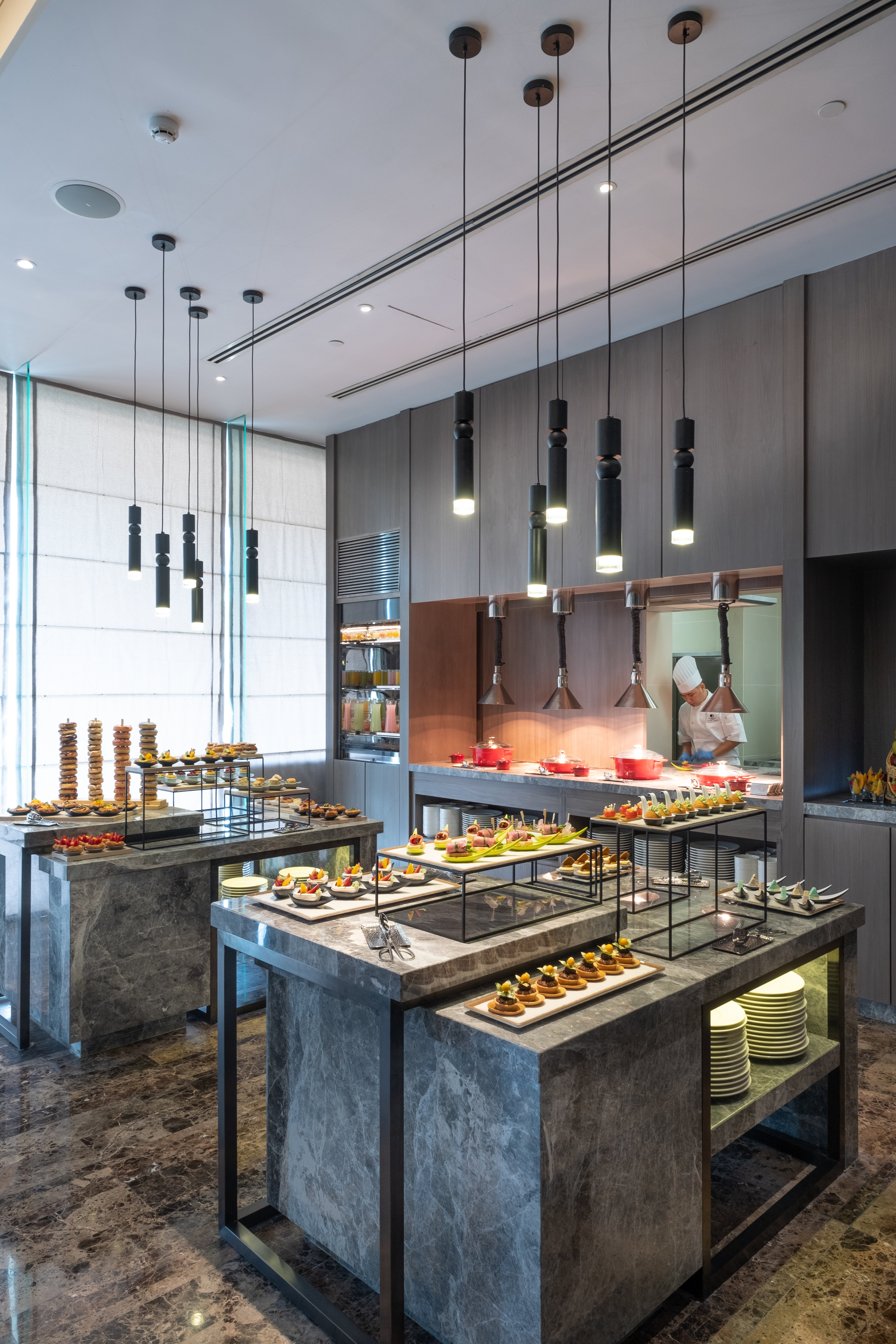 Executive lounge buffet and food area with chef