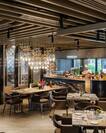 Makan Kitchen restaurant dining area and buffet counter with chef