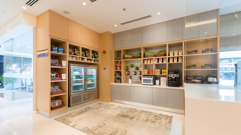 Pantry with Snacks, Beverages and Convenience Items for Guest Purchase