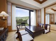 Korean Style Guest Suite with Korean Style Seats, Table and Outside View