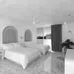 Hotellihuone, jossa kaksi vuodetta