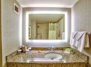 Standard Guest Bathroom Vanity with Amenities and Shower