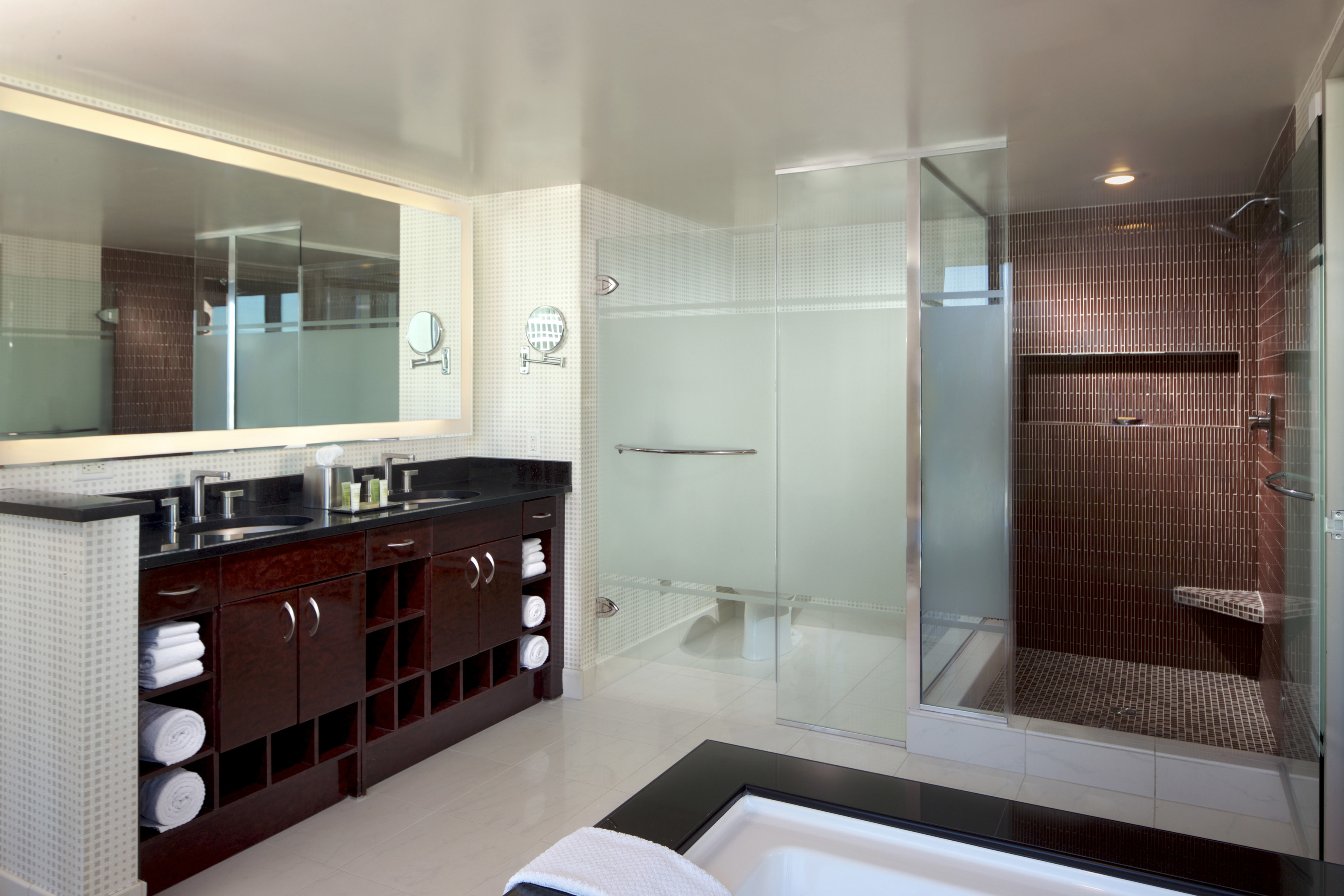Corner Suite Bathroom with Walk-in Shower