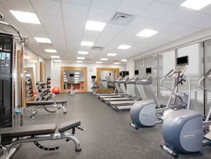 Fitness Center with Treadmills, Cross-Trainers, Weight Machine and Weight Bench