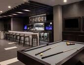 Bar Lounge Area with Bar Counter, Stools and Pool Table