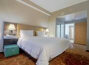 Bed in Executive King Suite with attached Conference Room