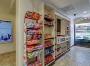 Snack Shelves and Refrigerated Items in Suite Shop