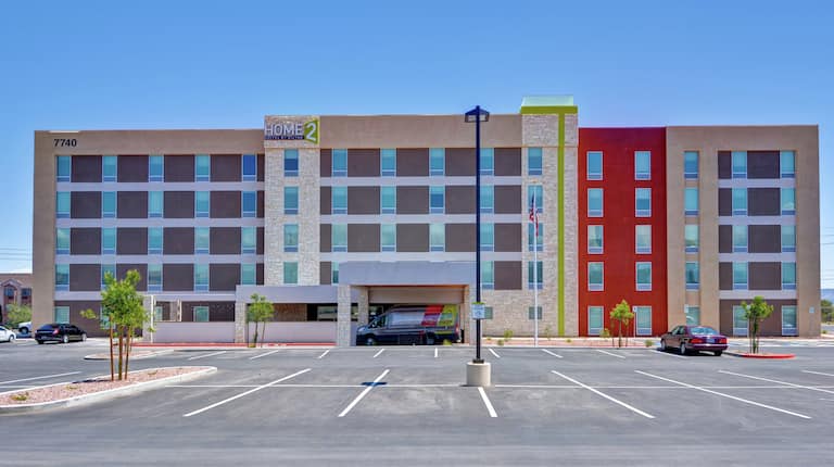 Hotel Exterior Building and Parking Lot in Daytime