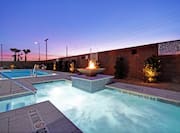 Outdoor Pool and Whirlpool Area at Sunset