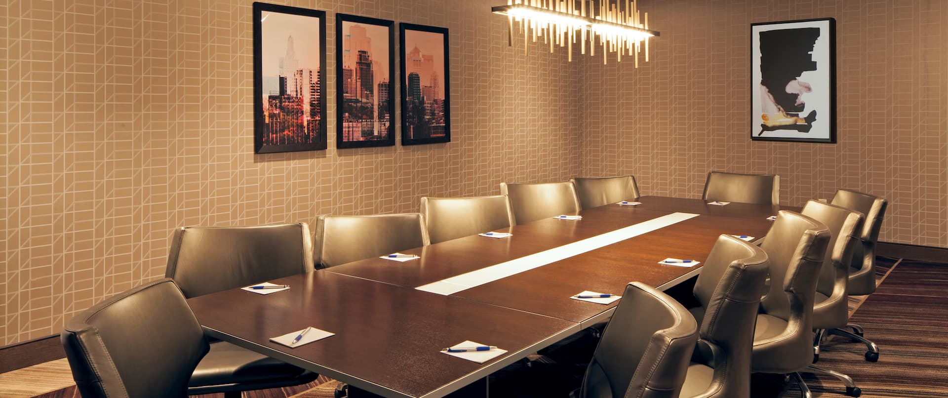 Boardroom Setup With Wall Art and Seating for Pp to 12 People