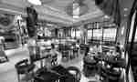 Restaurant with customers sitting at tables