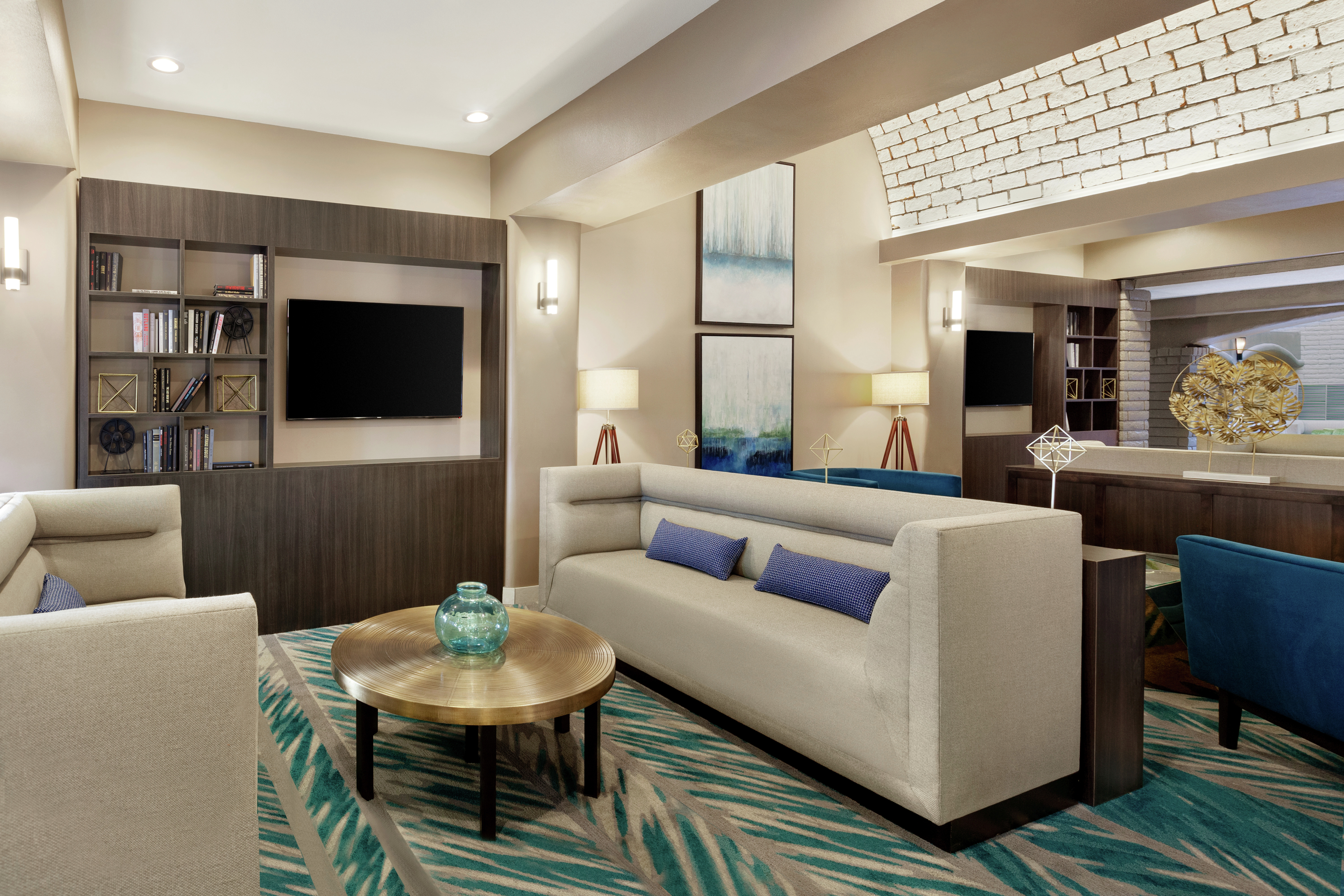Embassy Suites Lobby and Lounge Area with TV