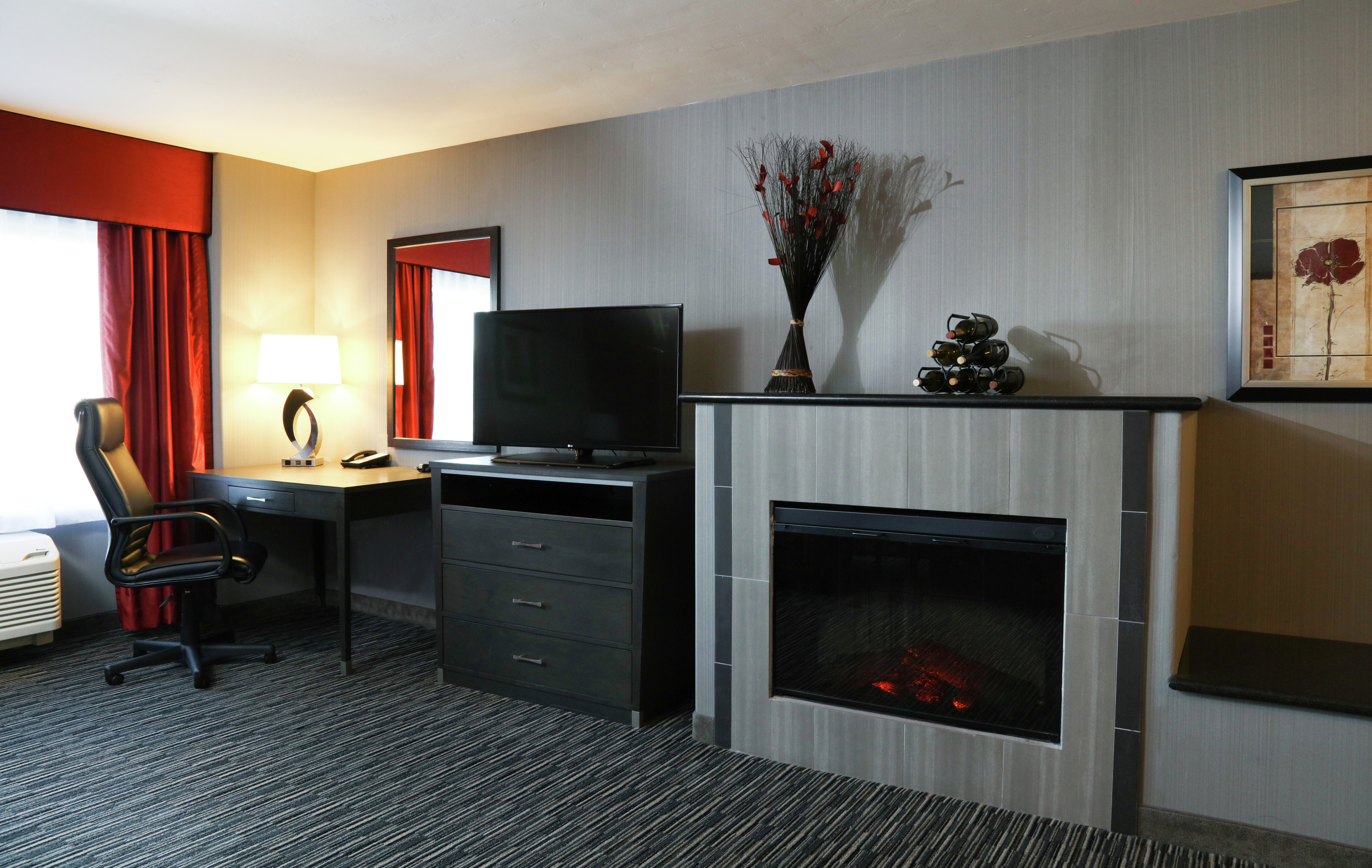 Accessible King Guestroom with Fireplace, Work Desk, and Room Technology