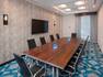 Meeting Room With Boardroom Setup, Seating for 10, and Wall Mounted TV