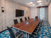 Meeting Room With Boardroom Setup, Seating for 10, and Wall Mounted TV