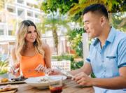 couple eating at outdoor table