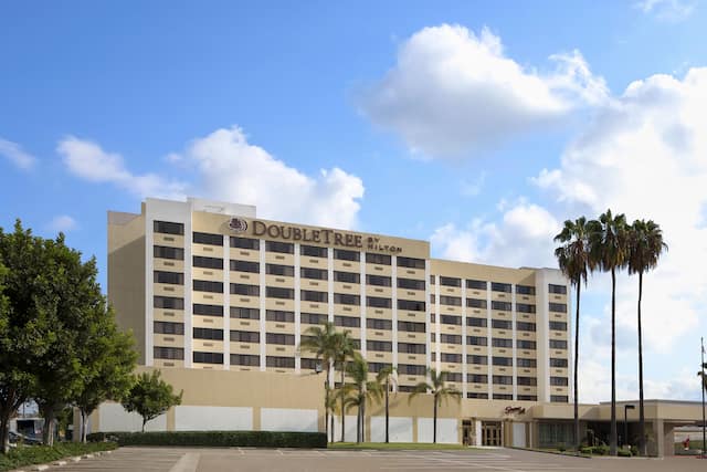 Hotel Exterior Across Parking Lot in the Daytime