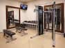 Fitness Center with Weights Exercise Balls and HDTV