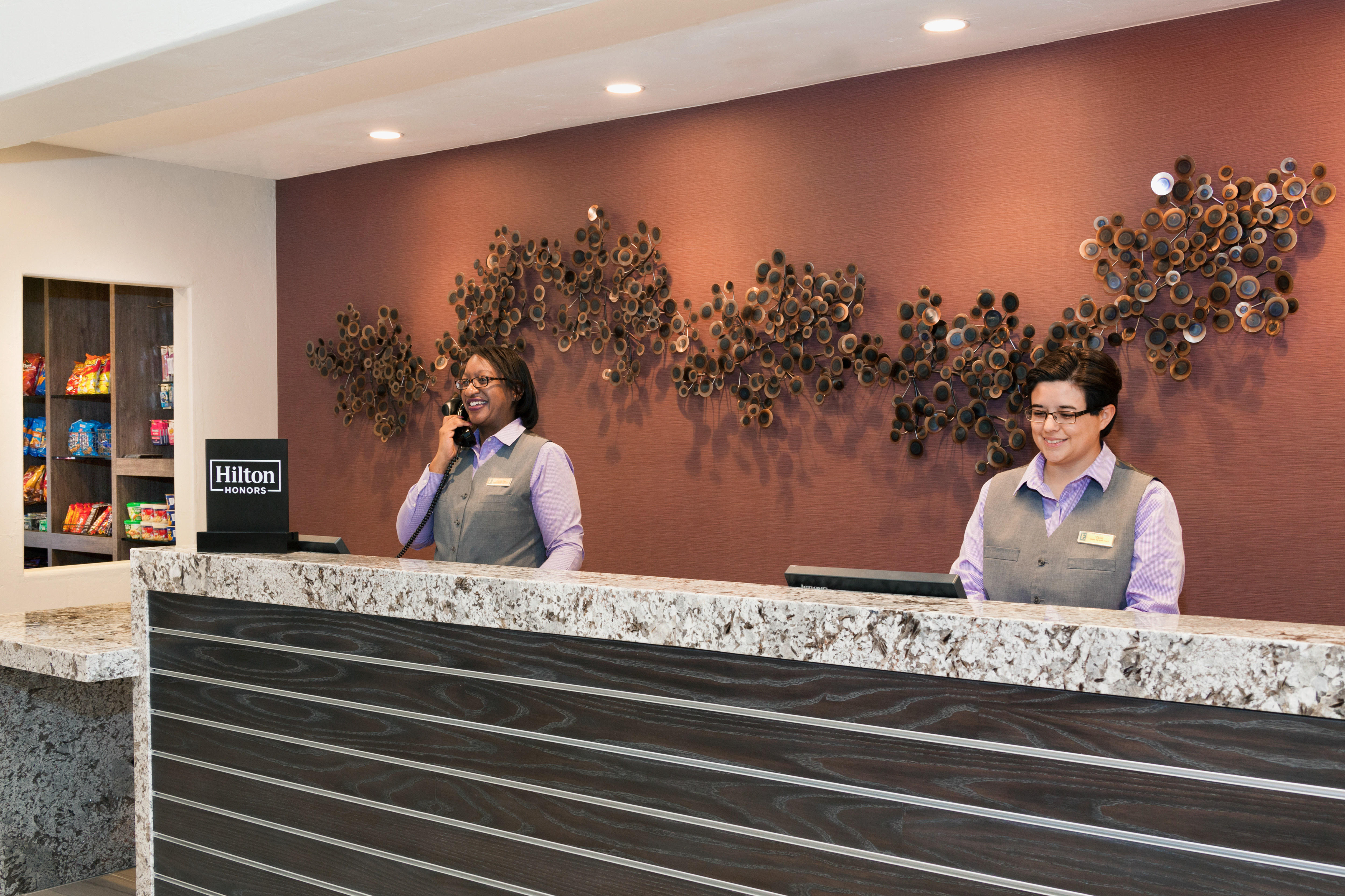 Front Desk with Two Staff Members