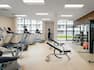 Fitness center with treadmills and weight equipment