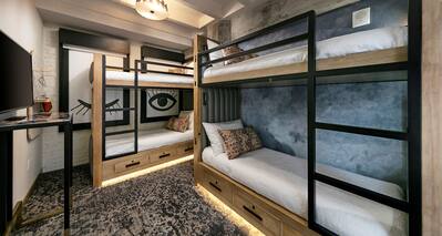 Quad bunk beds room with TV