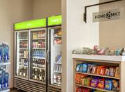 Convenient in-lobby market fully stocked with snacks and beverages for guests,