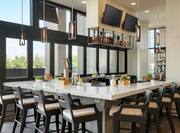 Convenient on-site restaurant featuring fully stocked bar with beautiful outside view.