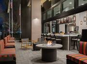 Stunning on-site restaurant featuring spacious outdoor patio with firepit and fully stocked bar.