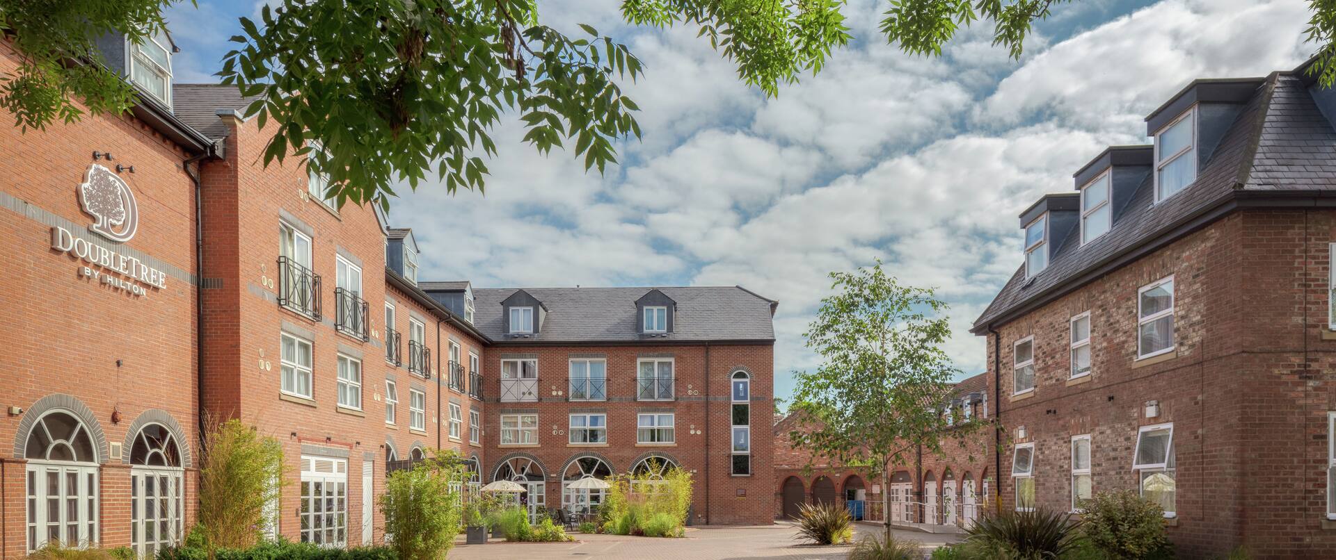 External shot of the main entrance and car park