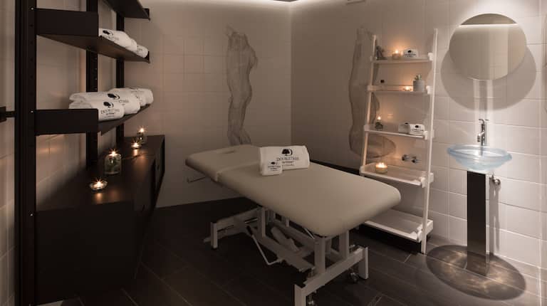 Spa treatment room with towels