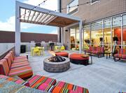 Patio Seating Large Open Air Space with Metal Pergola and Firepit, Banquette Seating and Tables