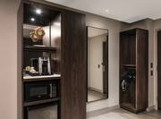 Hospitality Center With Microwave, Mini-Fridge, and Keurig Coffeemaker, Full Length Mirror and Clothing Storage Area in Deluxe Accessible Room