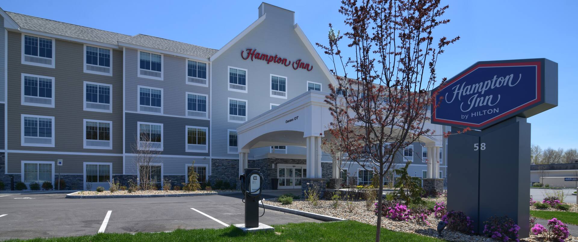 Hampton Inn Hotel Exterior with Sign