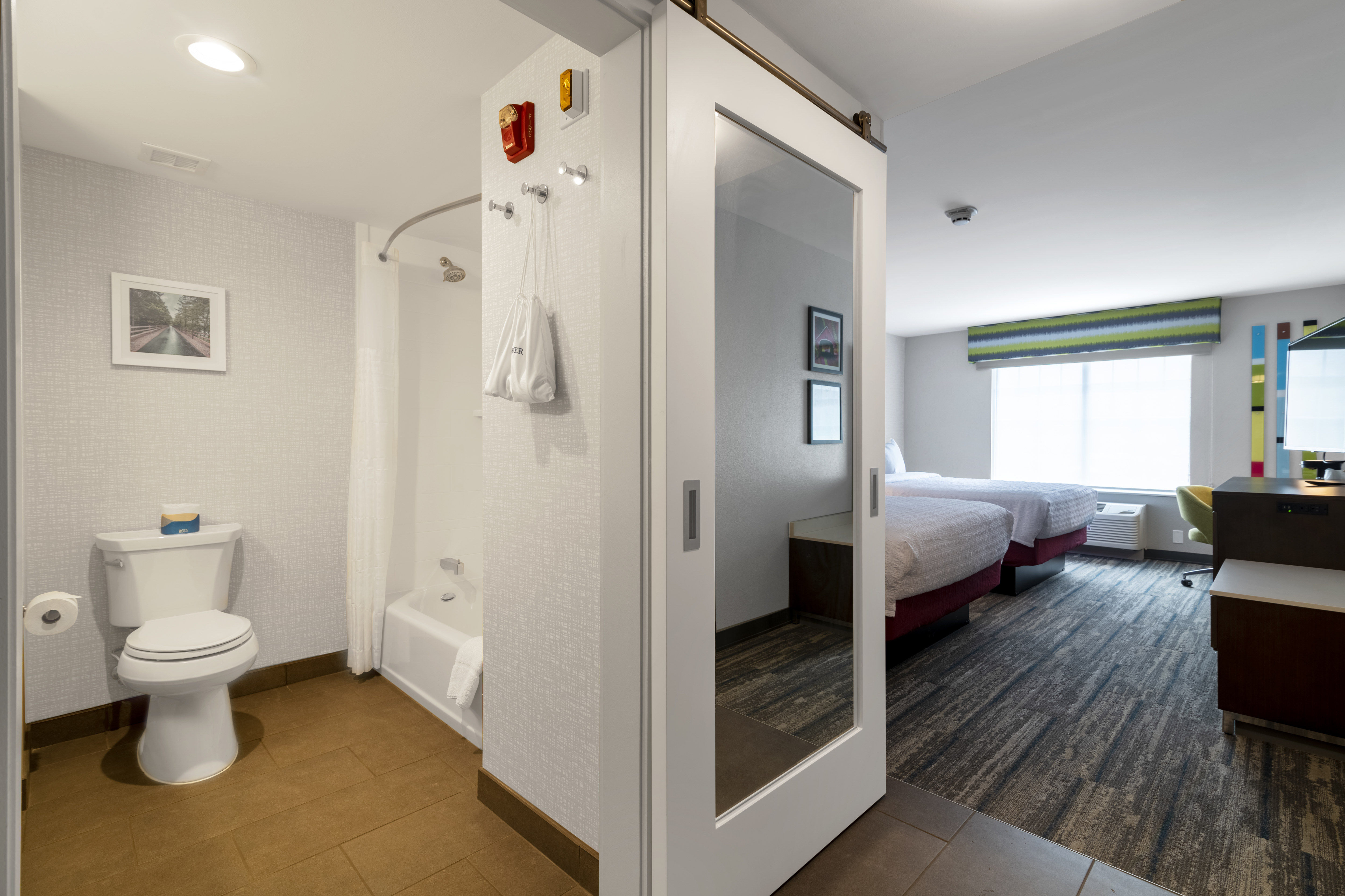 Accessible Room with Two Beds, Work Desk, and Bathroom Shower