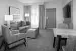 Guest Room Lounge Area with TV