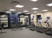 Fitness Center With Large Mirrors, and Cardio Equipment