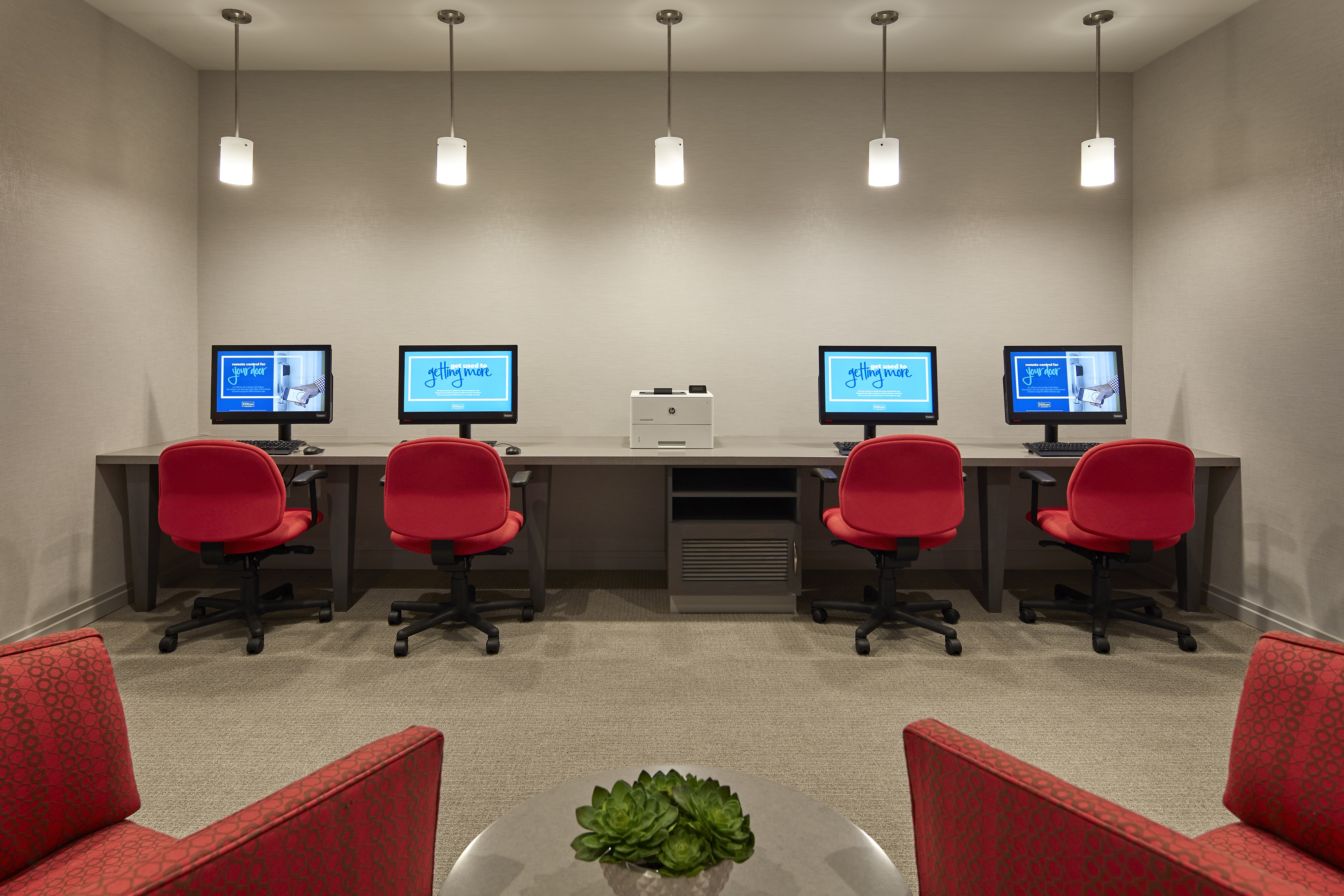 Business Center with Four Desktop Computer, Printer and Four Computer Chairs