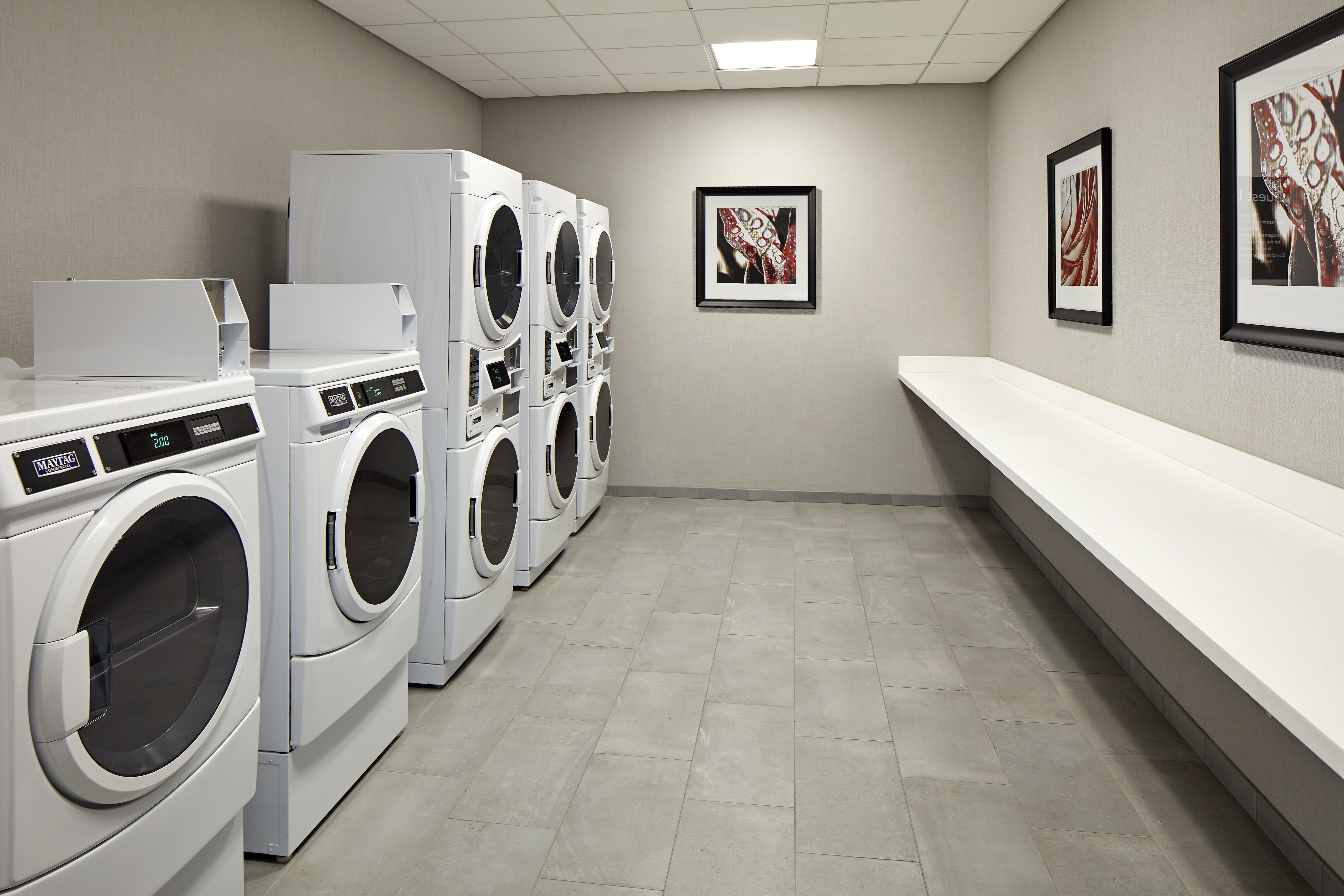 Guest Laundry Area with Coin-Operated Washing Machines