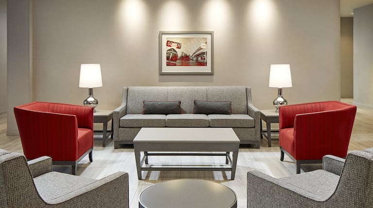 Lobby Seating Area with Armchairs, Coffee Table and Sofa