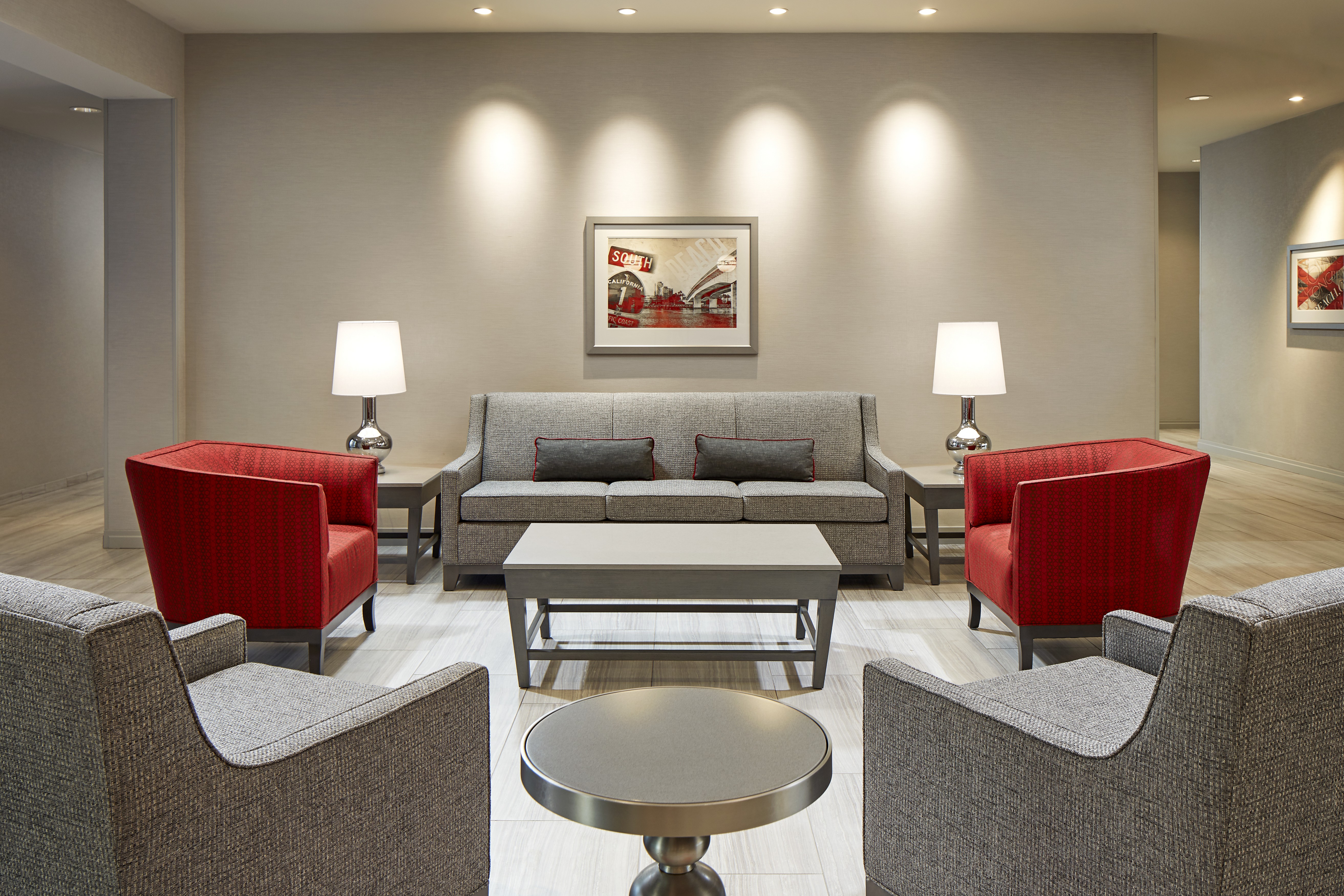 Lobby Seating Area with Armchairs, Coffee Table and Sofa