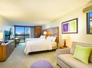 Junior Suite With Two Queen Beds, Wall Art, Sofa, TV, Faceted Mirror Above Work Desk by Balcony With Ocean View