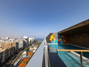 Rooftop Pool Area with City View